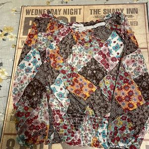 Adorable multi-colored floral blouse with gathered elastic waistline & neckline
